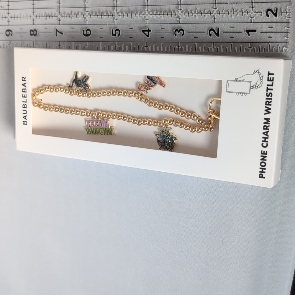 BaubleBar Halloween Themed Gold Tone Phone Charm Wristlet - Picture 7 of 7